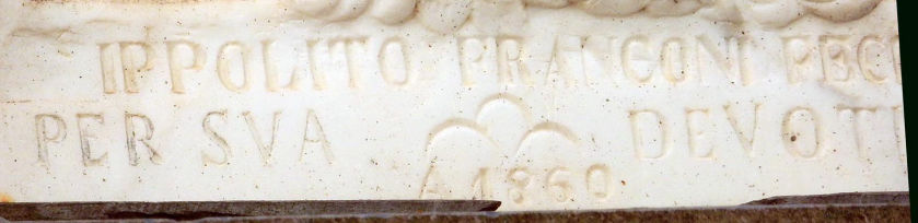 Iscrizione in basso della formella