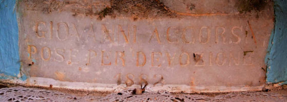 Iscrizione sotto la formella