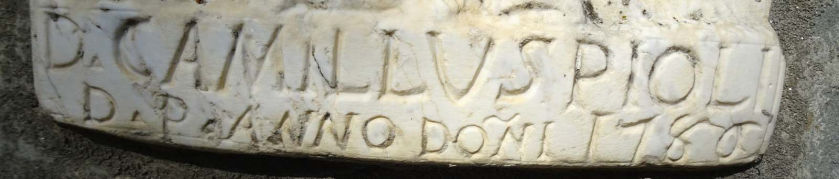 Iscrizione in fondo alla formella