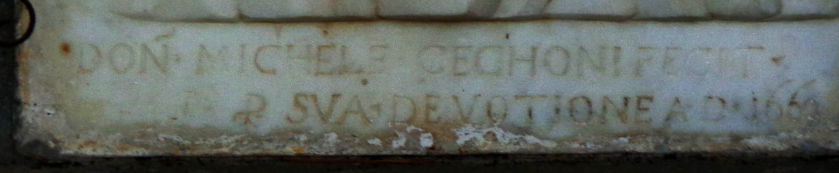 Iscrizione sotto la formella