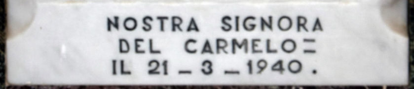 Iscrizione in basso alla formella