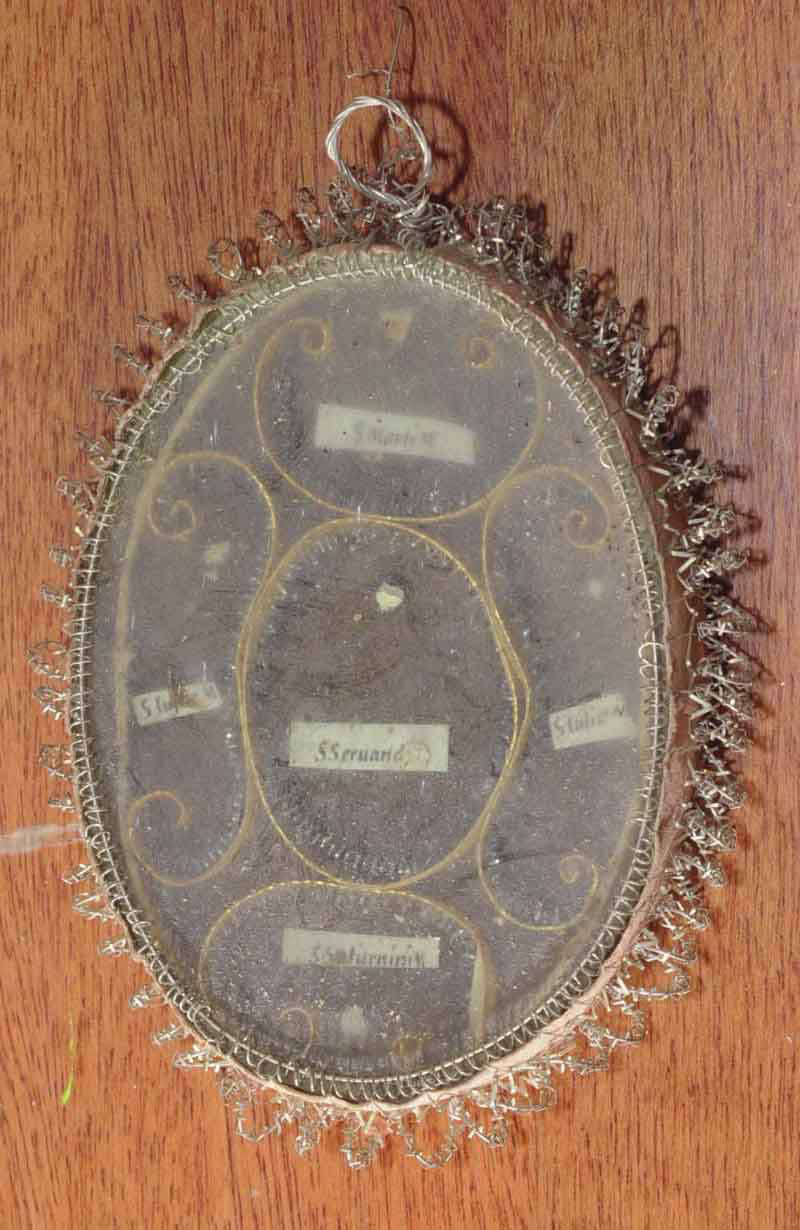 Reliquiario a medaglione con cinque reliquie